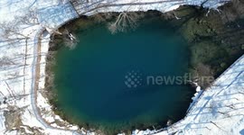Winter transforms Lake Yesilgoz into snow-covered landscape in southern Türkiye