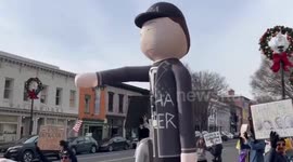 Tesla Takedown protest targets Elon Musk imagery in Washington, DC, USA