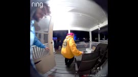 Cat Escapes When Opening the Door to Christmas Carolers