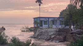 House Falls Into River in Bangladesh