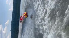 US: Falling off of tube on lake