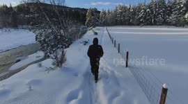 Deep Freeze in Scotland: Walking Through Thick Snow by Frozen River Dee
