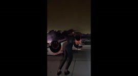 Woman Dances in Front of Her Flipped Tesla