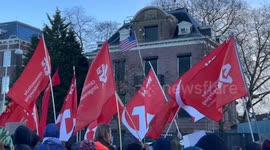 Demonstrators rally in Amsterdam against US military action in Venezuela