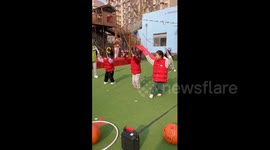China: Kindergarten children in China enjoy outdoor winter activities