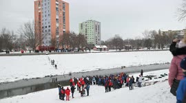 Winter swimmers brave icy waters for Three Kings tradition in Slovakia