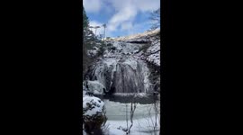 Icy waterfall transforms the Isle of Skye into a winter wonderland in Scotland, UK