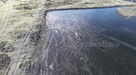 UK: Drone Captures Frozen River Thames in Oxford Amid Snow and Ice Warnings