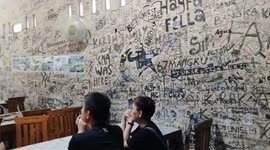 Customers Graffiti Every Surface at Unique Lobster Restaurant Near Timang Beach, Yogyakarta