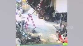 Mechanic escapes serious injury after lorry cab suddenly drops on top of him
