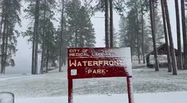 Heavy snowfall blankets Medical Lake Waterfront Park, Washington, USA
