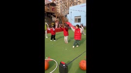 Nursery children enjoy chilly outdoor winter activities in China