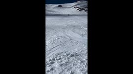 Fast descent skiing on the snowy slopes in Chamonix-Mont-Blanc, France