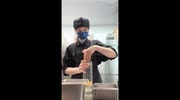 Cafe worker in China caught mixing tea with her hands