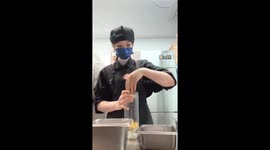 Cafe worker in China caught mixing tea with her hands