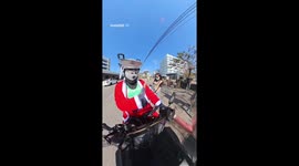 Motorcycle taxi rider becomes a hit with his wacky helmets