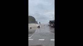 Powerful waves flood coastal road in Llançà, Girona, Spain