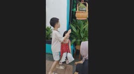 Kids Pull Rod to Receive Apam Balik in Fun Street Food Moment