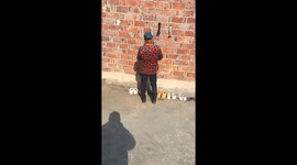 Chinese woman showed a strange but effective way to dry socks on the wall