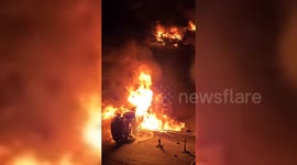 Iran: Vehicles Set Ablaze in Tehran as Protests Continue