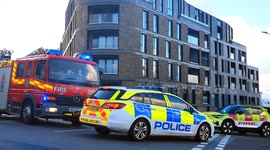 Storm Garetti: Firefighters Act to Prevent Glass Fall from Luxury Apartments.