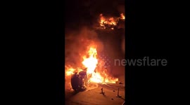 Iran: Security Force Vehicles Set Ablaze During Protests in Tehran