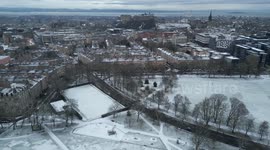 Drone footage shows Edinburgh blanketed in snow after wintry overnight conditions