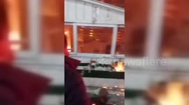 Iran: Tehran Protesters Burn Police Post