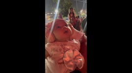 Baby mesmerized by fireworks in Vitória, Espírito Santo, Brazil