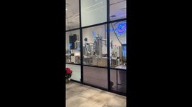 Star Wars vs. Rise of Robots: Revenge of the Clankers. I glanced to my left and through the glass at Planet 13, I saw : robotic arms dueling with glowing lightsabers.