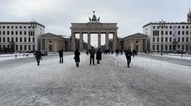 Germany: Winter weather grips Berlin as snow covers the Brandenburg Gate