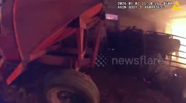 US: Police Officers Rescue Cows From Burning Barn