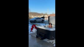 Guy Throws Giant Snowball Into Girlfriend's Hot Tub