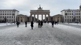 Germany: Winter weather grips Berlin as snow covers the Brandenburg Gate