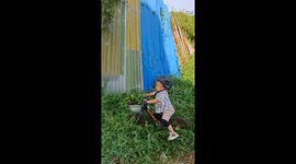 Child falls while biking at eco Islamic boarding school field, Indonesia