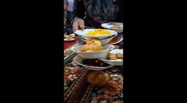 Man Showcases Unique Plate-Carrying Skill at Traditional Wedding in Indonesia