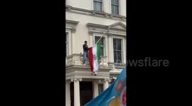 UK: A protester climbed the Iranian embassy in London and tore down the current Iranian flag, replacing it with the banned pre-revolution “Lion and Sun” emblem