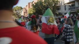 US, Los Angeles: Westwood U-Haul Accelerates Into Crowd Of Iranian Demonstrators On Camera