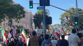 US, Los Angeles: Westwood Westwood U-Haul Accelerates Into Crowd Of Iranian Demonstrators On Camera Part 3
