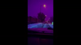 UK: Pink Sky Baffles Residents in Birmingham During Winter Storm