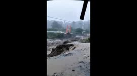 Flash flood destroys bridges and homes in villages in Indonesia