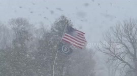 Sudden snow squall blankets quiet roads in New York, USA