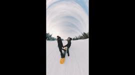 Skier lands on snowboarder in nail-biting close-call during mountain descent