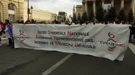 French doctors rally in Paris against health budget cuts