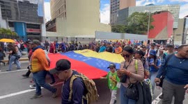Thousands march in Caracas demanding immediate release of Maduro