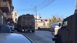 Israeli soldiers arrest two Palestinians during raid on Nablus