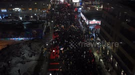 Thousands gather in Minneapolis for vigil honoring Renee Good