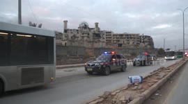 Syria begins to transfer surrounded SDF members from Aleppo after halt of military operations