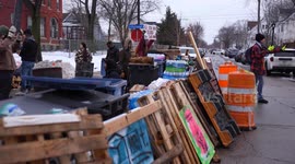 Protesters set up barricaded encampment near site of fatal ICE shooting in Minneapolis