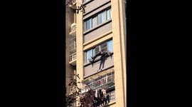 Chinese man rescued an elderly resident who was falling from a tall building